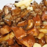 Mushroom Poutine · Our signature steak cut fries, tossed with white cheddar cheese curds and drowned in our cla...