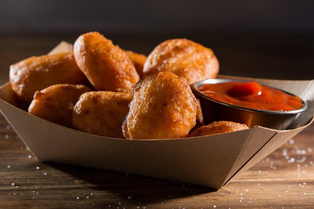Mac & Cheese Bites · All the comfort of mac and cheese in a fried bite-sized snack. If you can think of anything that doesn't taste better fried, please let us know.