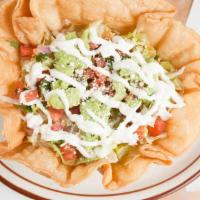 Taco Salad · Served with your choice of meat, rice, whole beans cheese, lettuce, sour cream, pico de gall...