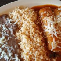 Enchiladas Michoacanas · Comes with four enchiladas filled with cotija cheese, onions, and oregano.  Toppings include...