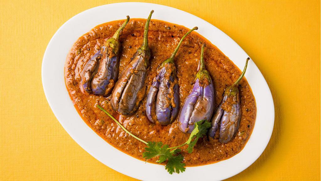 Bagara Baingan · Egg plant pieces cooked with peanut sauce, Sesame and coconut with mixed spices.