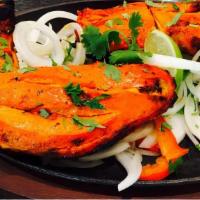 Full Tandoori Chicken (4 Pieces) · Grilled Chicken Breast and Leg Pieces marinated in Spices and Yogurt.