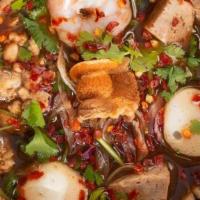 N9. Thai Boat Noodle · Contains Shrimp, Fish Ball, Meatball, Ground Pork, Quail Egg, Vietnamese Sausage with Fresh ...