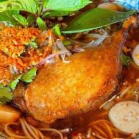 N11. Duck Leg Thai Boat Noodle · Contains Duck Leg, Fish Ball with Rice Vermicelli (Served chopped cilantro, onions, fried ga...