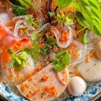 N13. Thai Street Noodle Soup · Contains Shrimp, Fish Ball, Meatball, Ground Pork, Quail Egg, Vietnamese Sausage with Rice V...