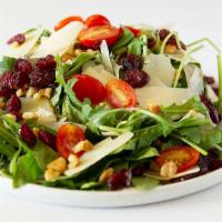 Spring Salad · Spinach, arugula, dried cranberry, walnut, parmesan cheese, and balsamic vinaigrette sauce.