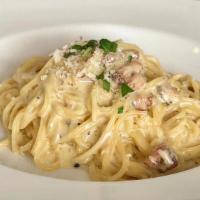 Carbonara · Gluten-free option. Spaghetti, eggs, parmigiano-reggiano, pancetta.