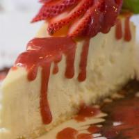 Cheese Cake · New York-style cheesecake with berry coulis.