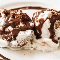 Profiteroles · chocolate mousse cream puff, white chocolate, milk chocolate curls