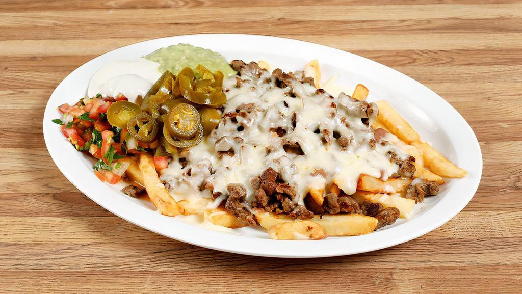 Nacho Fries · Choice of meat, choice beans, cheese, sour cream, pico de gallo, guacamole, jalapenos and French fries!
