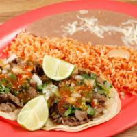 Taco Plate · 2 tacos choice of beans and rice