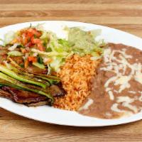 Carne Asada · Grilled steak topped with grilled green onions.
