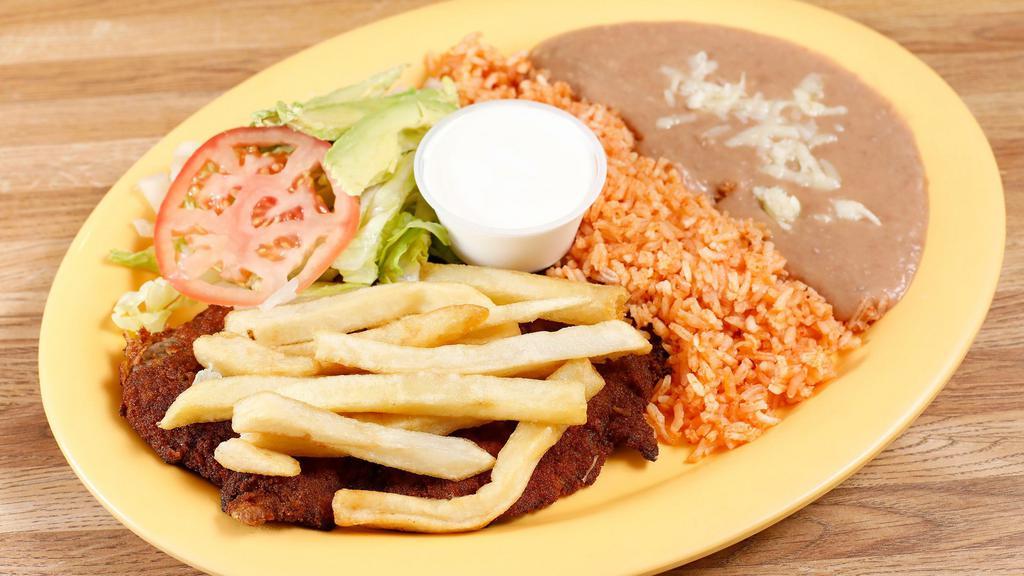Milanesa De Res · Fried Floured Steak,
Choice of Beans, Rice, Side salad and tortillas