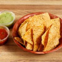 Chips and Salsa · Tortilla chips and 1 green and 1 red salsa.