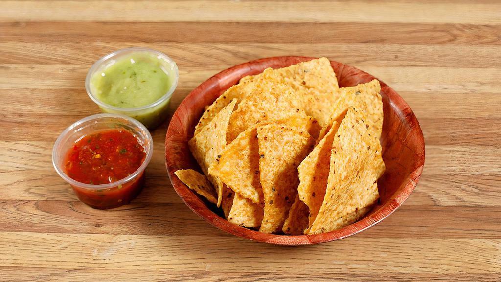 Chips and Salsa · Tortilla chips and 1 green and 1 red salsa.