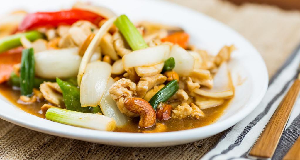 Cashew Nuts-Chicken · Sautéed garlic, mushrooms, bell peppers, onions, and cashew nuts.