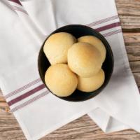 Pan de Bono (5) · warm tapioca rolls, queso fresco (gluten free)