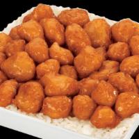 Large Orange Chicken · Light and crispy tempura white meat chicken, tossed in our signature orange sauce. Served wi...