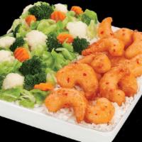 Large Sweet Chili Shrimp · Crispy, succulent shrimp, tossed in a sweet and mildly spicy Asian chili sauce. Served with ...