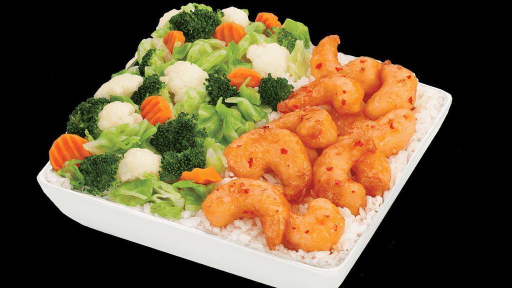 Large Sweet Chili Shrimp · Crispy, succulent shrimp, tossed in a sweet and mildly spicy Asian chili sauce. Served with your choice of rice and veggies..