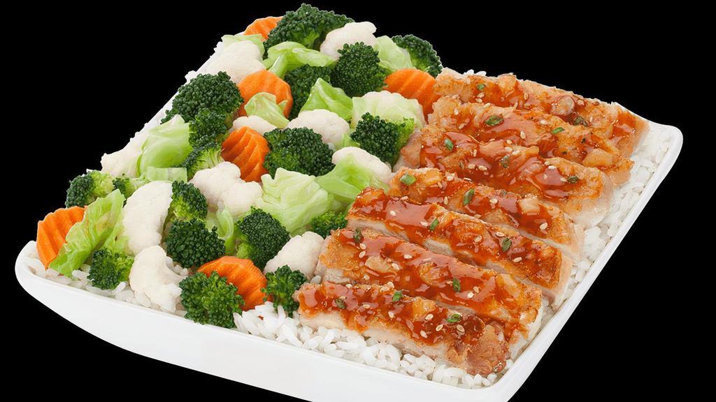 Large Habanero Chicken · Fresh, grilled chicken, glazed with our spicy and sweet habanero pineapple sauce and topped with sesame seeds and green onions. Served with your choice of rice and veggies..