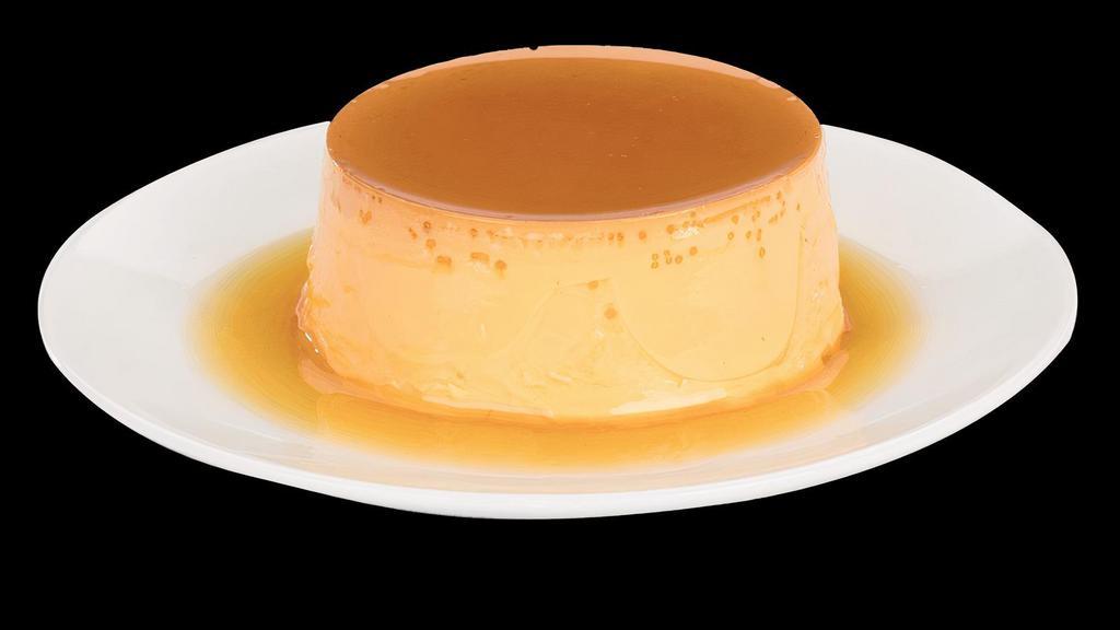 Flan · Creamy egg custard, topped with sweet and golden caramel sauce.
