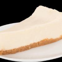 Cheesecake · Sweet and creamy New York style cheesecake, baked on a buttery graham cracker crust.