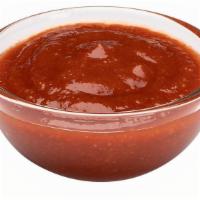 Sriracha Sauce · Hot sauce made from sun-ripened chili peppers with a hint of garlic.