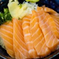 Salmon Don · Raw salmon sashimi over rice.
