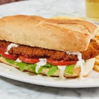 Milanesa · Hand-battered in our signature seasoning fried
chicken with aioli, arugula, and tomato