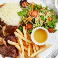 Bife Acebolado · Thin cut sliced premium Picanha with grilled onions
served with rice, beans, French fries, a...