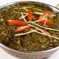 Palak Paneer · Paneer cooked in a spinach curry.