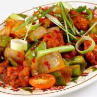 Chily Chicken · A Chinese delicacy with onion and bell pepper.
