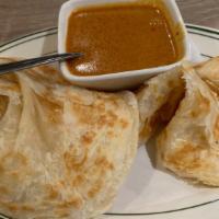 Roti Canal · Malaysian all time favorite crispy pancake with curry dipping sauce.