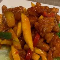 Mango Chicken · Spicy. Chicken and shredded mango in a sweet and sour tomato sauce.