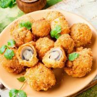 Fried Mushrooms · Basket of fried mushrooms served with ranch