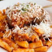 Sorelle Short Rib Bolognese · Homemade Bolognese sauce with braised short rib over a bed of Ziti.