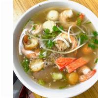 45. Hủ Tiếu Dai Hải Sản Thập Cẩm (Clear Noodle Soup) · With shrimps, squid, fish cake, crab meat and chicken.