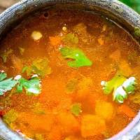 Rasam Soup · Tomato seasoned with tamarind juice and aromatic spice