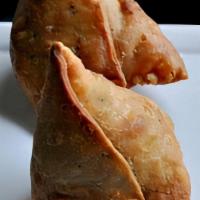 Samosa · Fried homemade street-food style pastry with savory filling such as potatoes, peas, lentils ...