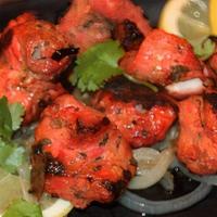 Chicken Tikka Tandoor · Chicken breast marinated in yogurt, ginger garlic, and mild spices. Baked in a special clay ...