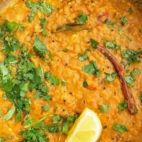 Dal Fry · Lentil cooked with onion, tomato, and tempered in homemade ghee