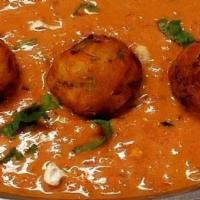 Malai Kofta · Freshly minced veg and cheese balls cooked in rich creamy sauce