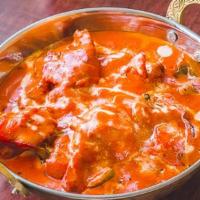 Tikka Masala · Cooked in exotic creamy sauce with a blend of spice and fresh garlic