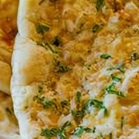 Paneer Naan · Naan baked in clay oven with grated cottage cheese