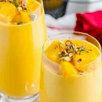 Mango Lassi · A popular Indian traditional refreshing yogurt drink churned with mango