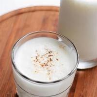 Sweet Lassi · A popular Indian traditional refreshing yogurt drink churned with sugar