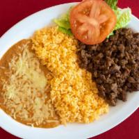 Combo Plate · Choice of meat, rice, beans, guacamole and tortillas.