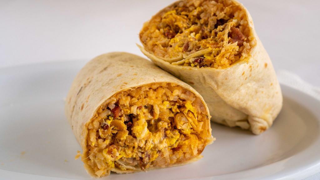 Breakfast Burrito · Choice of meat, beans, egg, rice, sour cream and cheese.