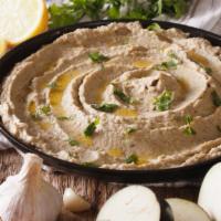 Baba Ghanoush · Chopped garlic, roasted eggplant dip with olive oil.